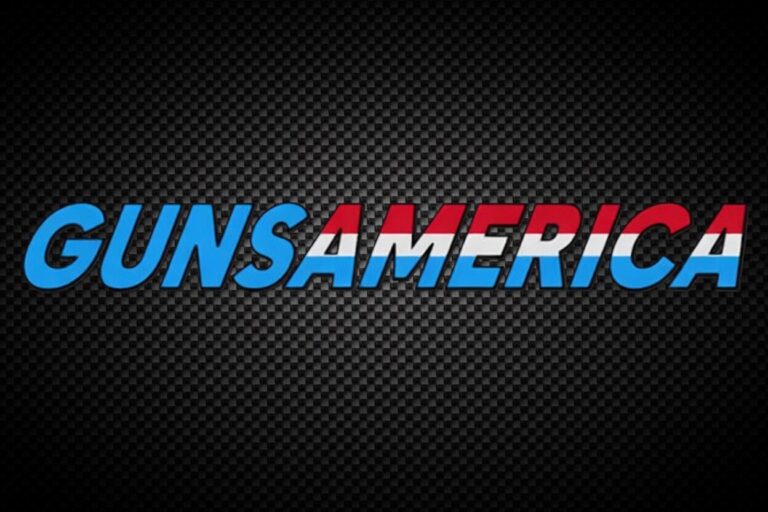 GunsAmerica logo with blue-to-red text on a dark carbon-fiber background.