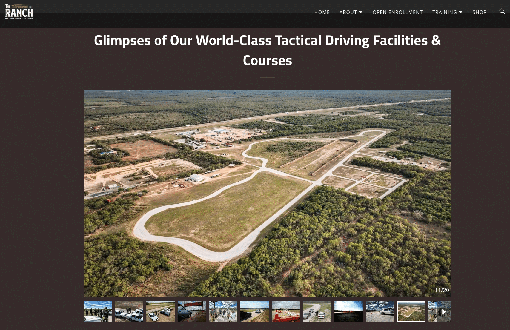 Aerial view of a world-class tactical driving facility with winding training tracks and surrounding landscape. نص